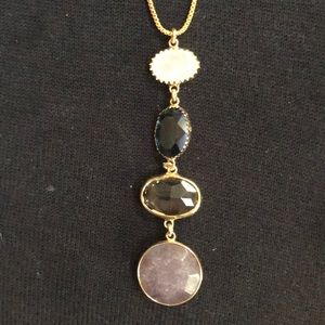 Adjustable necklace with stones